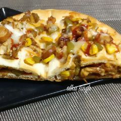 A picture of Packet pizza(stuffed with chicken sousage).