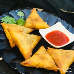 A picture of Whosaynas Veggies and Bean Sprouts Samosas.