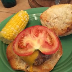 A picture of Caramelised onion and cheddar burger.