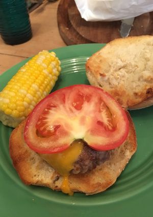 A picture of Caramelised onion and cheddar burger.
