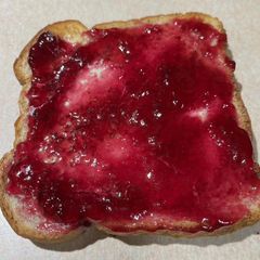 A picture of Butter and Plum Jelly Toast.