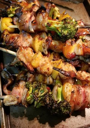 A picture of BBQ, Sweet Chili, & Peach Bacon Wrapped Shrimp Kabobs.
