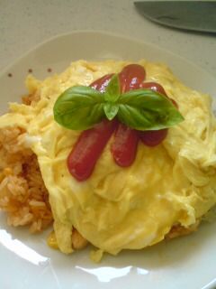 A picture of Delicious Omurice with Chicken Rice.