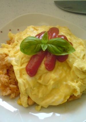 A picture of Delicious Omurice with Chicken Rice.