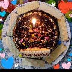 A picture of Wheat flour and oats eggless chocolate cake with dry fruits.