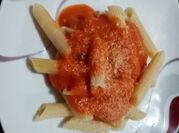 Una foto de pollo al pomodoro