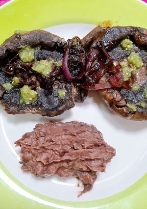 Una foto de Portobello, como hígado encebollado