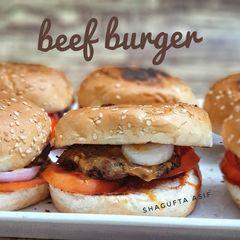 A picture of Beef Burger with fusion sauce.