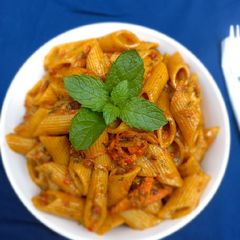 A picture of Penne Pasta in Red Sauce.