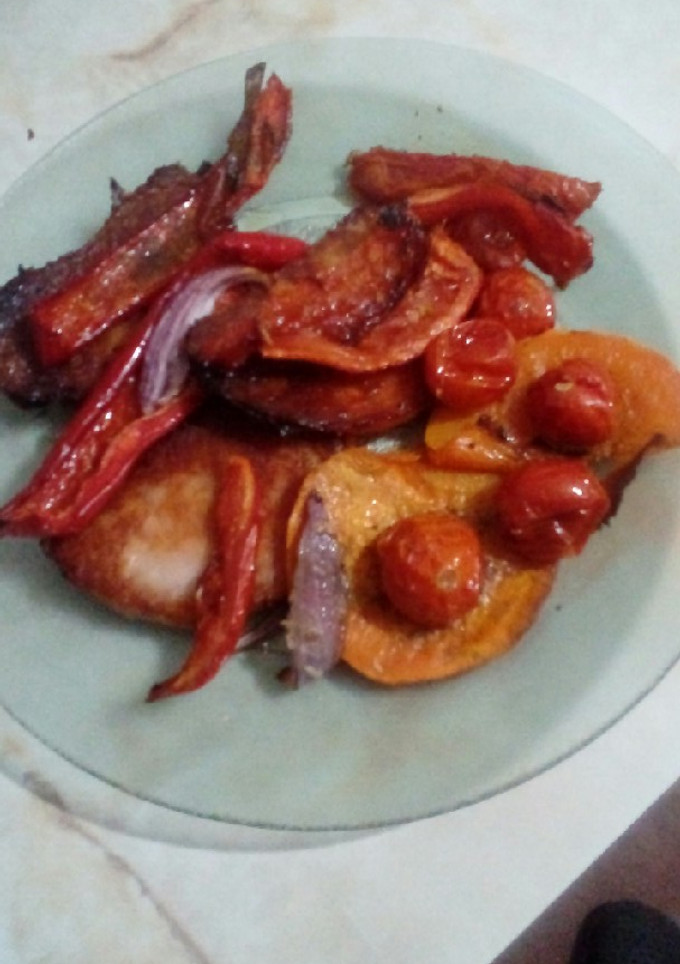 Una foto de Churrascos con tomatitos asados