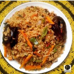 Jollof rice and beans with veggies A picture of Jollof rice and beans with veggies.