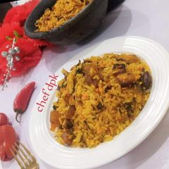 A picture of Naive jollof rice (local rice).