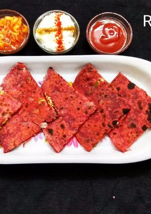 A picture of Beetroot Paneer Paratha.