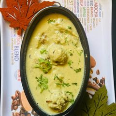 Yellow Gravy with bottle Gourd Kofta A picture of Yellow Gravy with bottle Gourd Kofta.