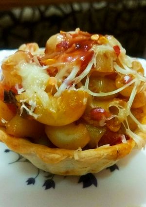 A picture of Cheesy pasta tart.