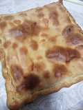 Empanada de pollo, bechamel y queso