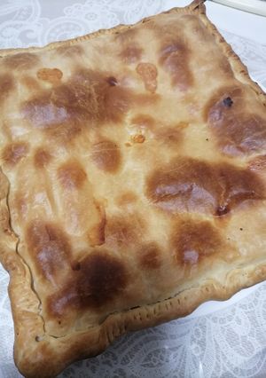 Una foto de Empanada de pollo, bechamel y queso