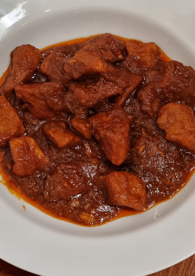 Una foto de Carne con tomate