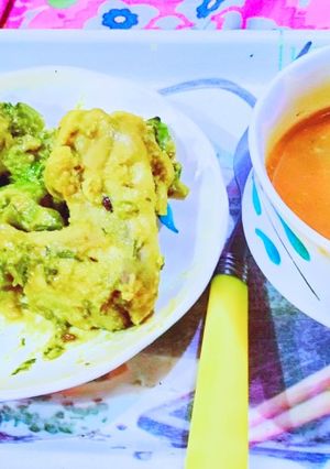 A picture of Homemade Tomato soup & Grilled chicken with saute green capsicum.