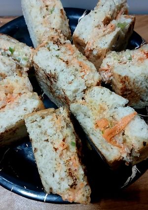 A picture of Hung Curd And Garlic bread bites.