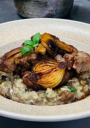 Una foto de Risotto de hongos con cordero