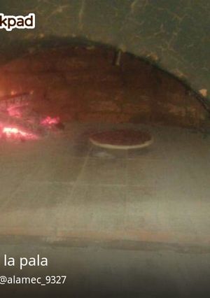 Una foto de Pizza a la pala