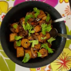 A picture of Peri peri chicken seekh with caramelized onions.