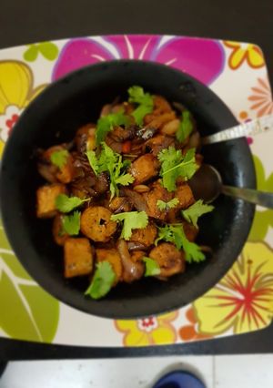 A picture of Peri peri chicken seekh with caramelized onions.