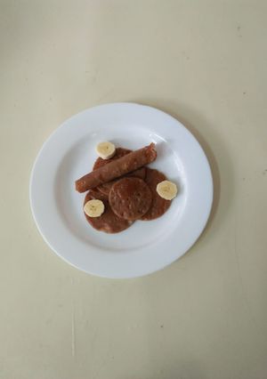 A picture of Sweet potato pancakes...with chocolate.