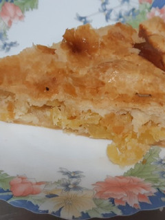 Una foto de Tarta de hojaldre de piña y coco, sin azúcar añadido