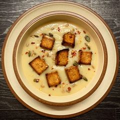 A picture of Celeriac Soup with Truffle Croutons.