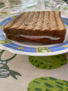 A picture of Toast with Kasseri, Mortadella, and Cream Cheese.
