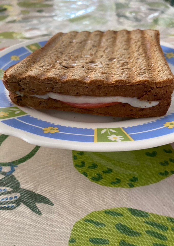 A picture of Toast with Kasseri, Mortadella, and Cream Cheese.