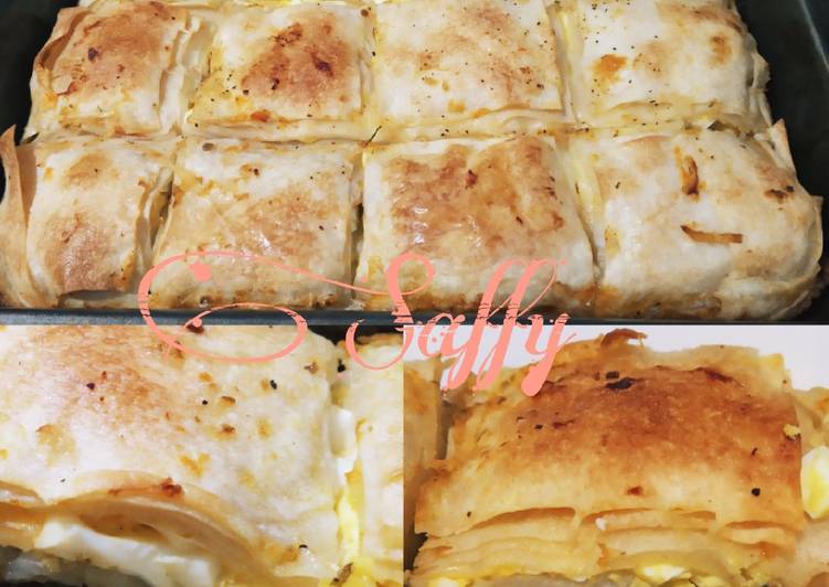 صينية رقاق باللحم المفروم والبيض المسلوق