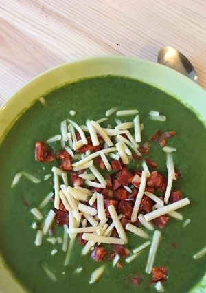 A picture of Broccoli and Pea Soup with Chorizo and Cheddar Cheese.