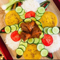A picture of Moong Masoor DaalBoiled RiceChicken Roast.