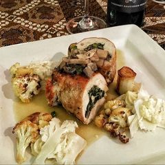 A picture of Chicken Roulade Stuffed with Wild Mushroom and Spinach.