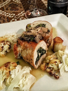 A picture of Chicken Roulade Stuffed with Wild Mushroom and Spinach.