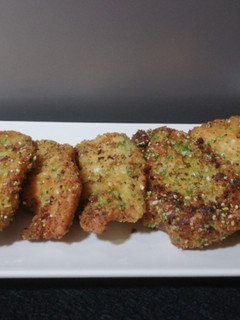 Una foto de Pechuga de pollo con rebozado vegetal