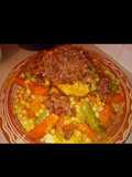 Moroccan Couscous with Chicken, Tfaya, and Vegetables