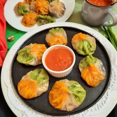 A picture of Tri Colour Veg Momo.