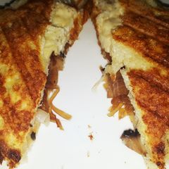 A picture of French toast with mushroom filling.