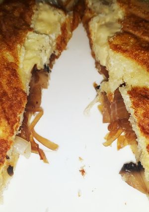 A picture of French toast with mushroom filling.
