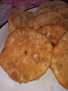 Una foto de Tortas fritas con almíbar 😋😍