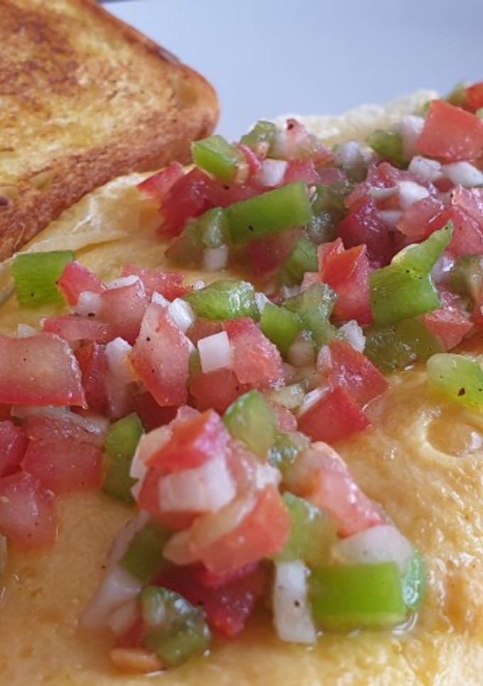 Una foto de Tortilla francesa rellena de queso