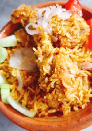 A picture of Butter chicken biryani.