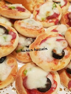 صورة لوصفة بيتزا بعجينه لكل المعجنات 🍕