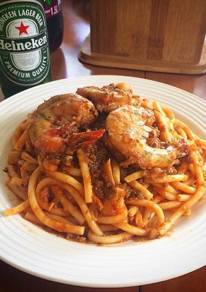 Una foto de Bugatelis con Colas de Langostinos Marinadas