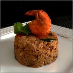A picture of Peri Peri Shrimp with Spicy Rice.