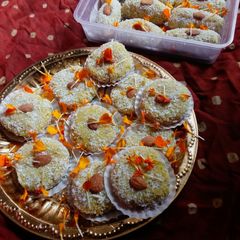 A picture of Coconut peda or rolls.